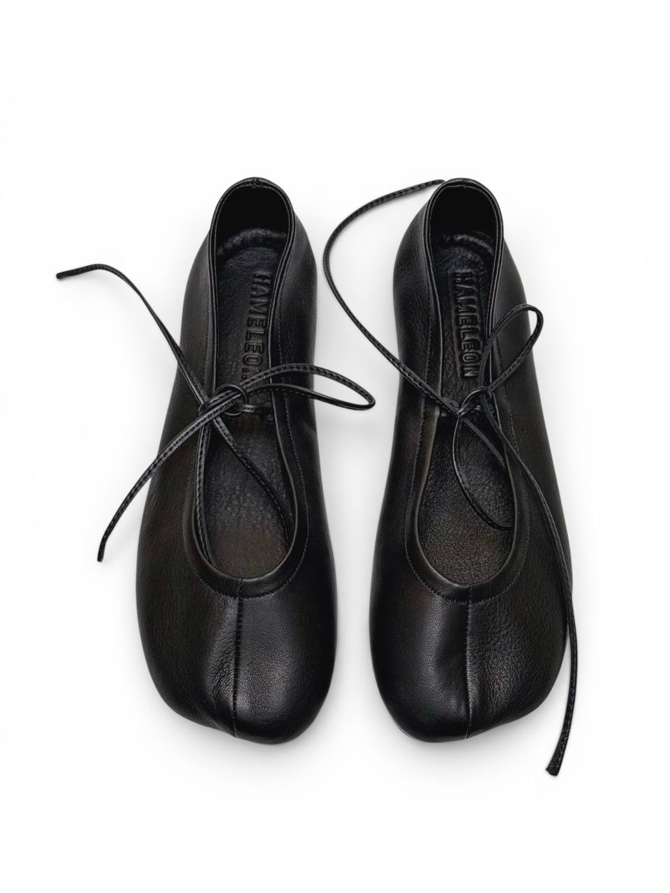 Minimalist dark blue ballet flats with lace detail