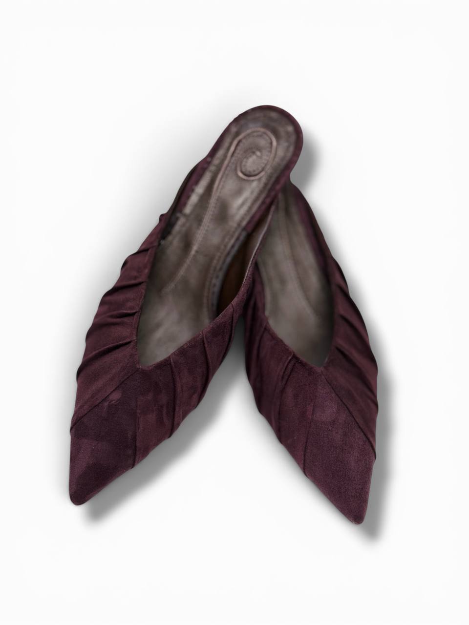 Minimalist pointed toe mule heels in soft Italian suede