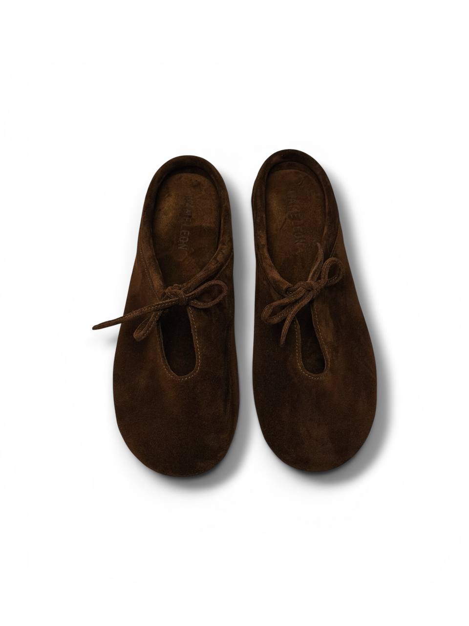 Contemporary suede mules for casual elegant styling