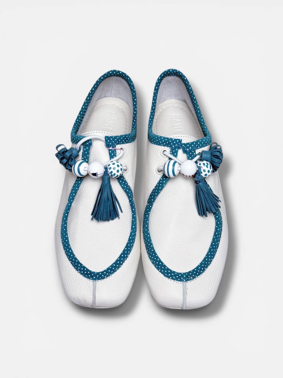 White leather walkers top view decorative lace detail