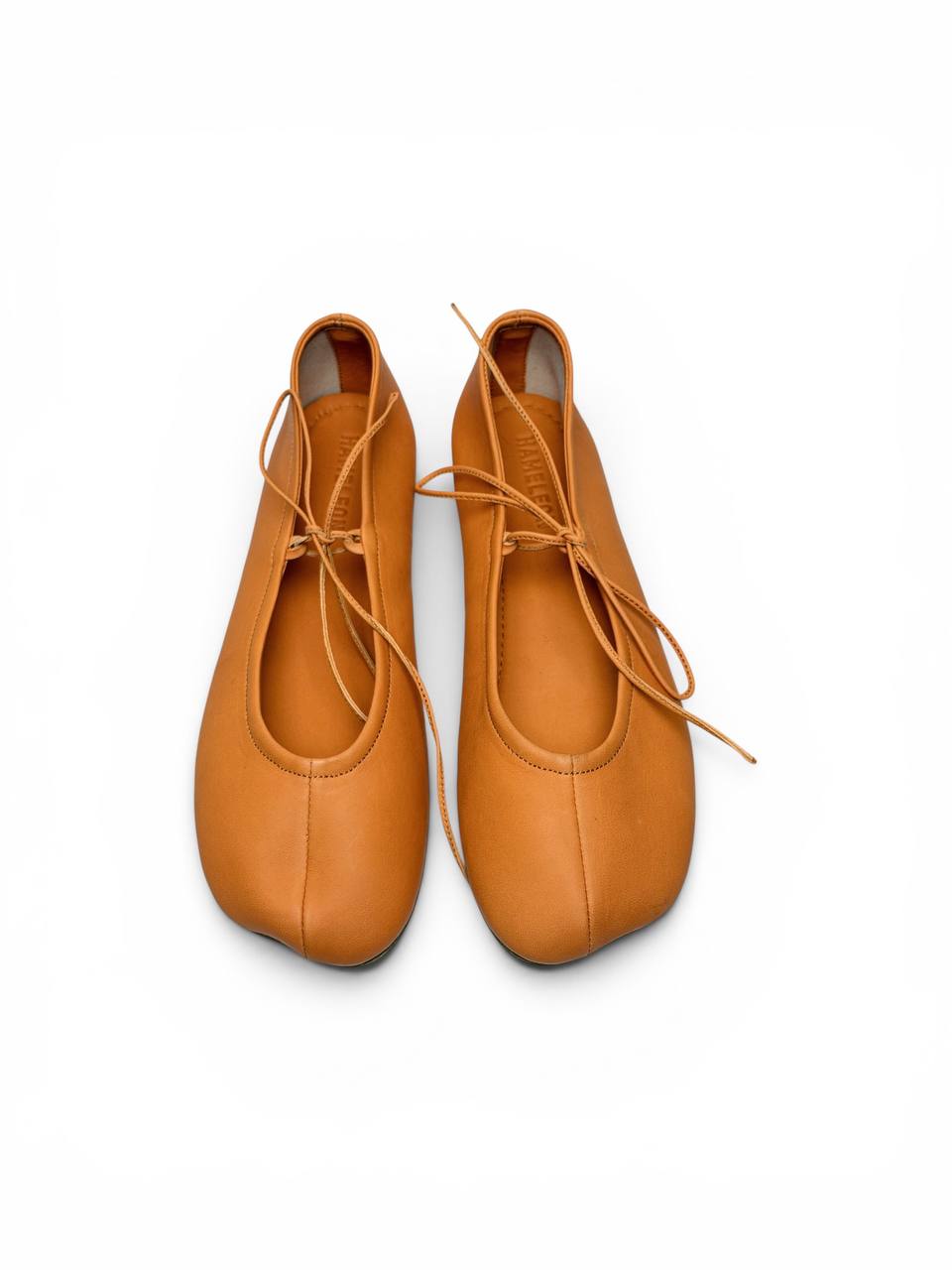 Handmade amber ballet flats top view