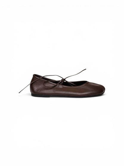 Side profile of handmade ballet flats