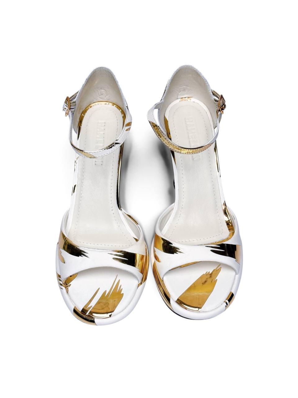 Front view of white and gold Buenos Aires sandals