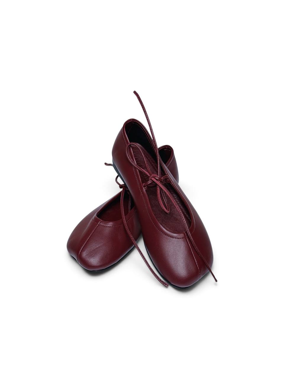 Claret leather ballet flats with rounded-square toes and lace ties