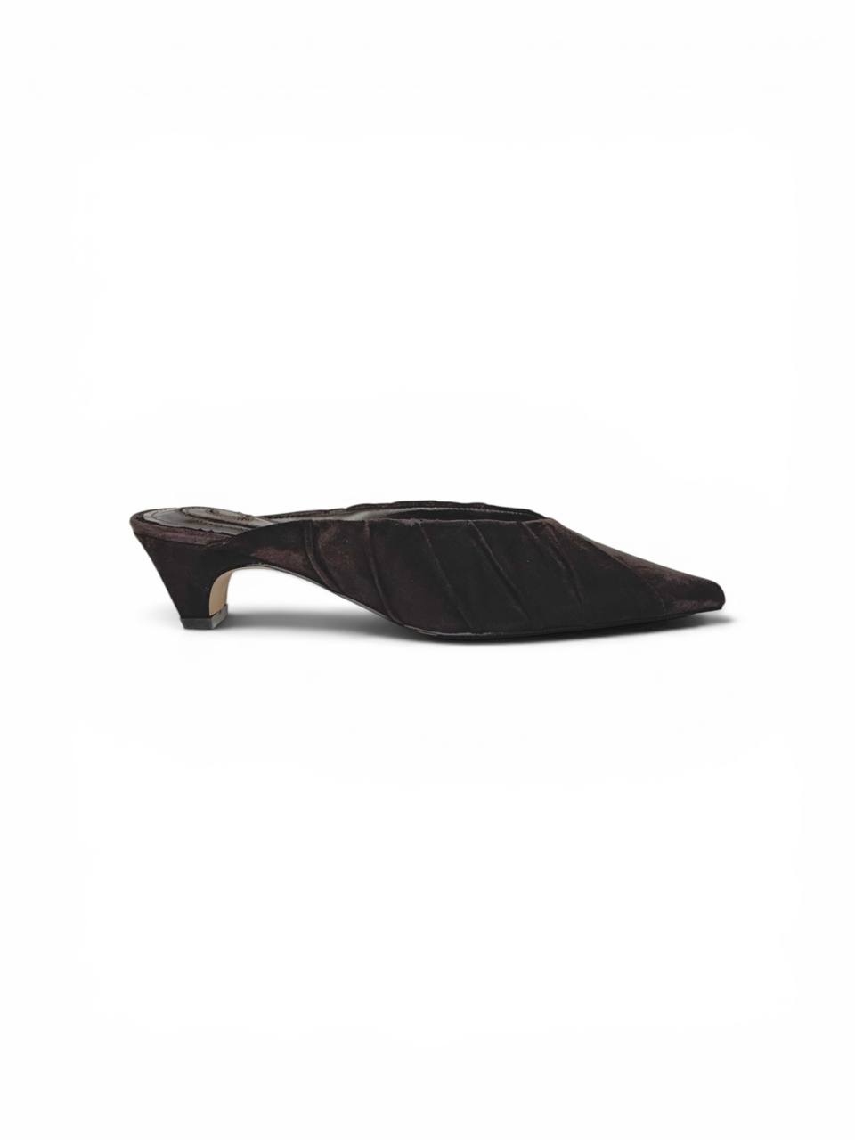 Minimalist mule heels crafted from soft Italian suede