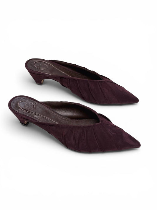 Burgundy suede mule heels with sculpted pointed silhouette