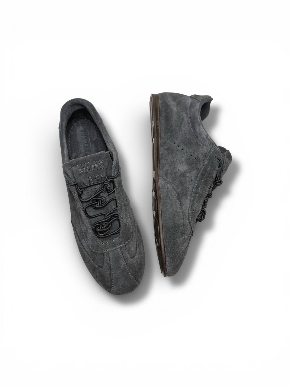 Handmade suede sneakers craftsmanship detail