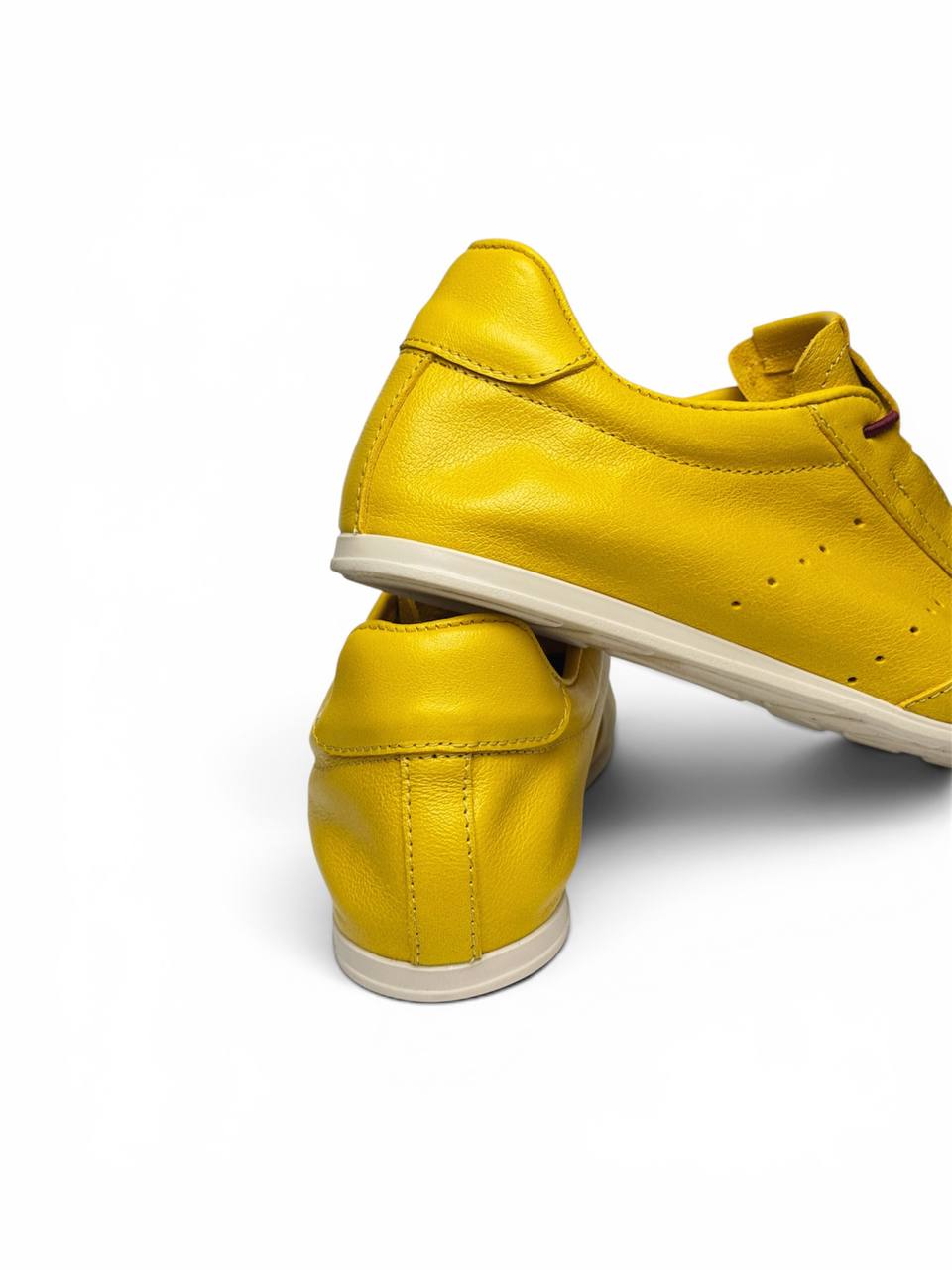 Premium saffron leather sneakers with refined finish