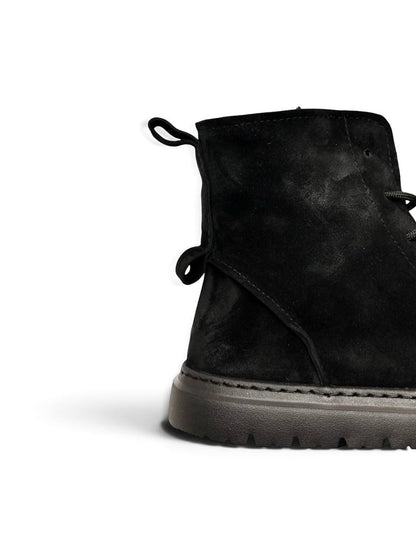 Close-up of Coal boots showing suede texture and heel