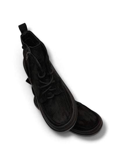 Top view of black suede Coal boots with lacing