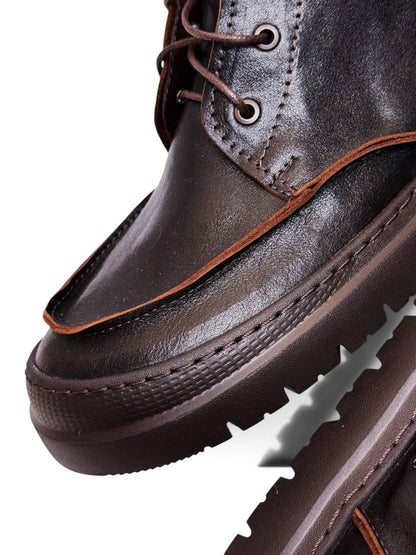 Close-up of Terra leather boots showing moc-toe stitching