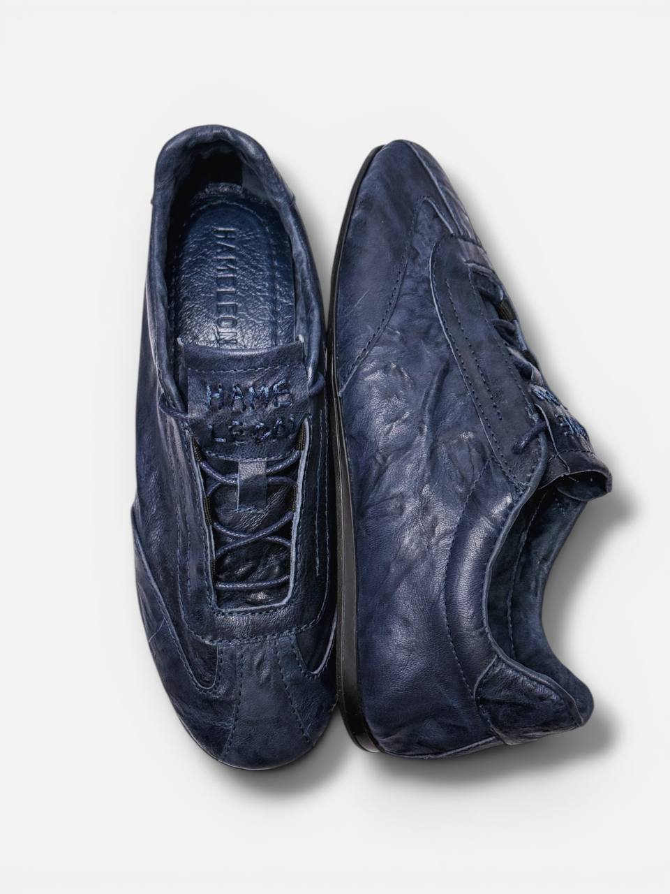 Leather sneakers lace system close-up minimal design