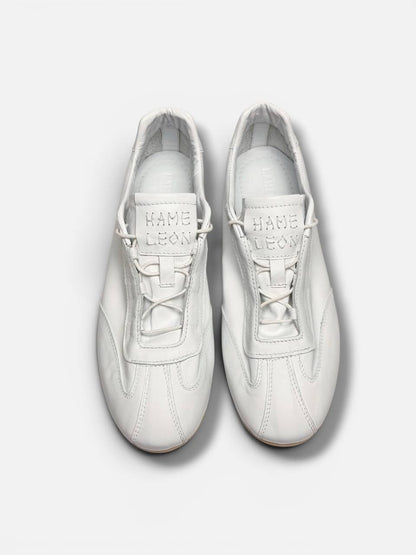 Editorial white leather sneakers Flow Pure contemporary minimalist style