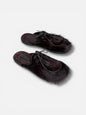 Pair of fur mules women’s handmade shoes editorial composition