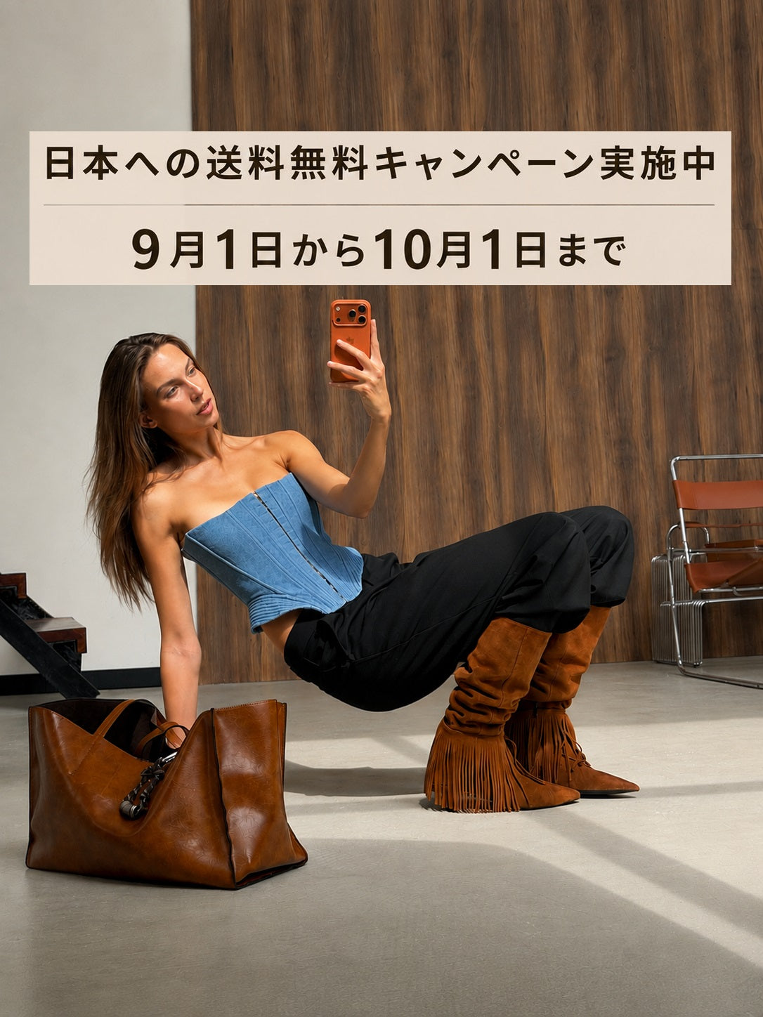HAMELEONのレザーブーツを履いた女性