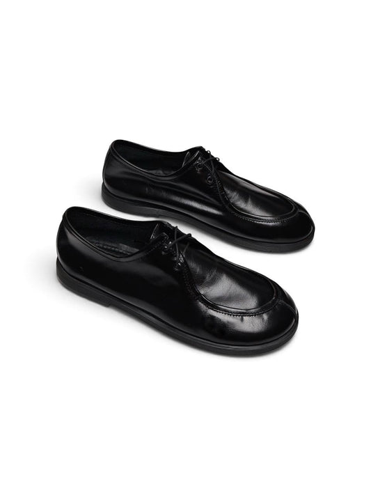 Black leather Walker shoes Onyx shown together in a three-quarter view