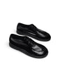 Black leather Walker shoes Onyx shown together in a three-quarter view