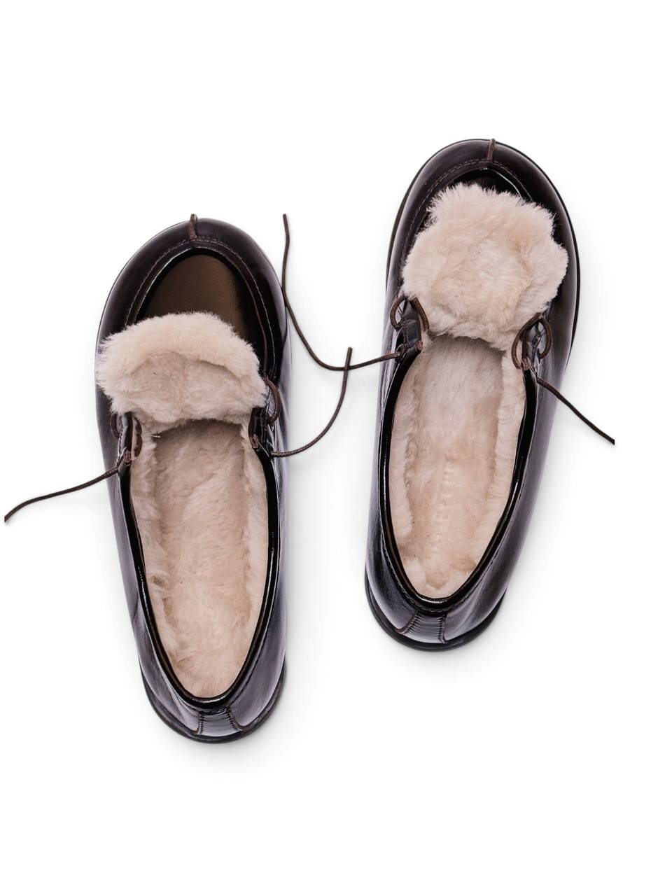Walkers Truffle shoes opened to show soft sheepskin lining and insoles.