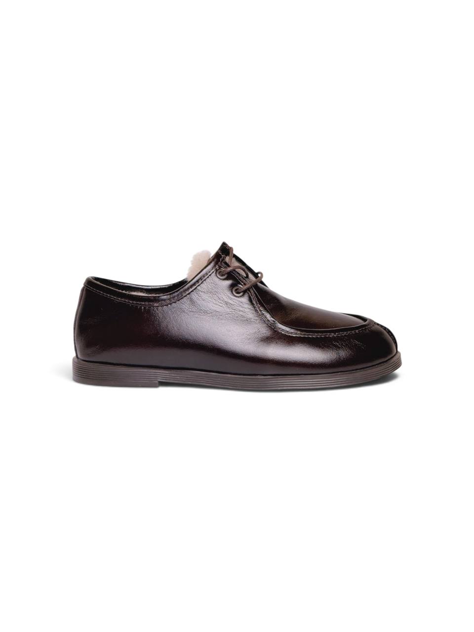Dark brown Walkers Truffle shoe shown in side profile with flexible sole.