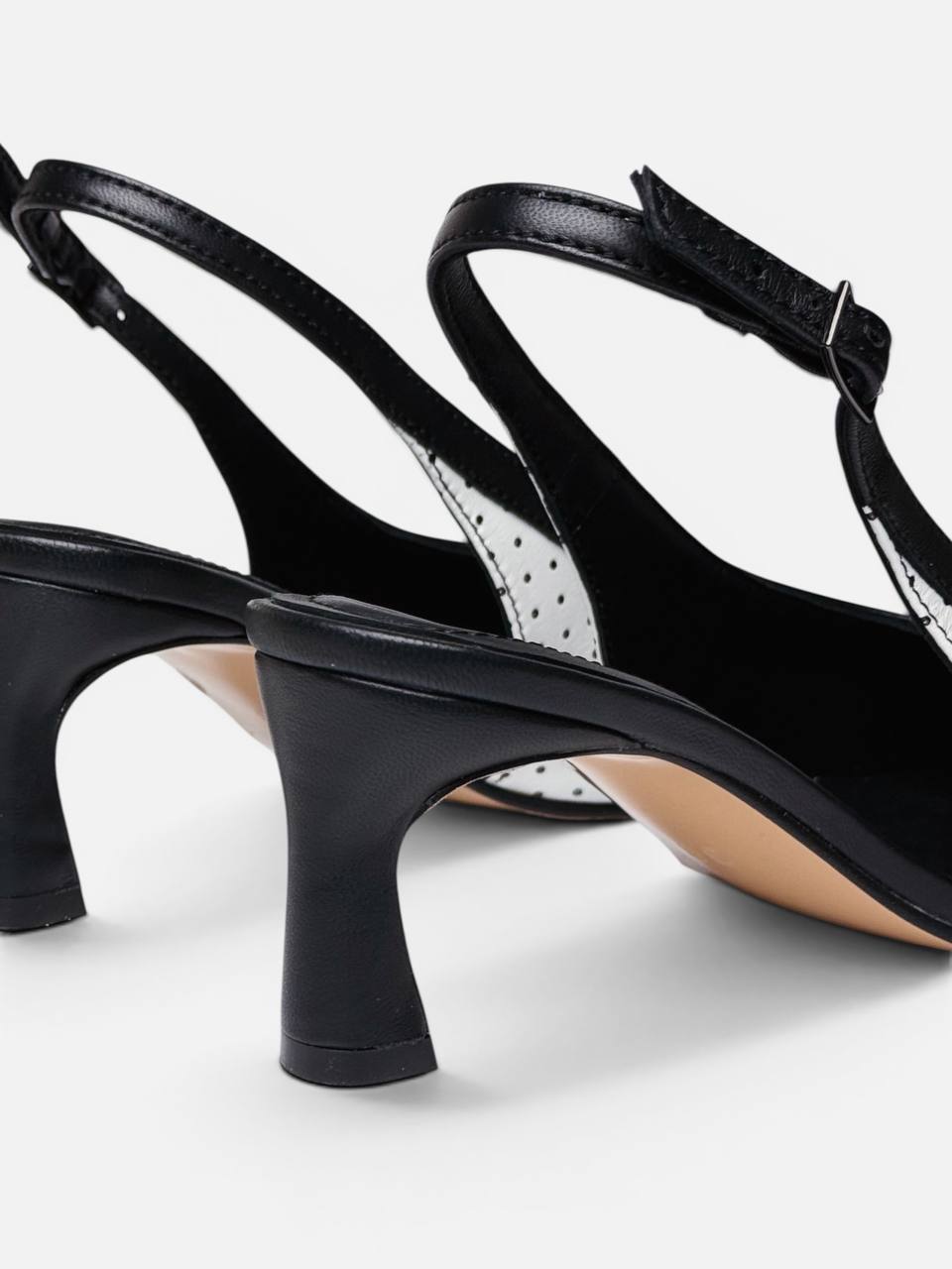 Handmade leather slingback heels close up