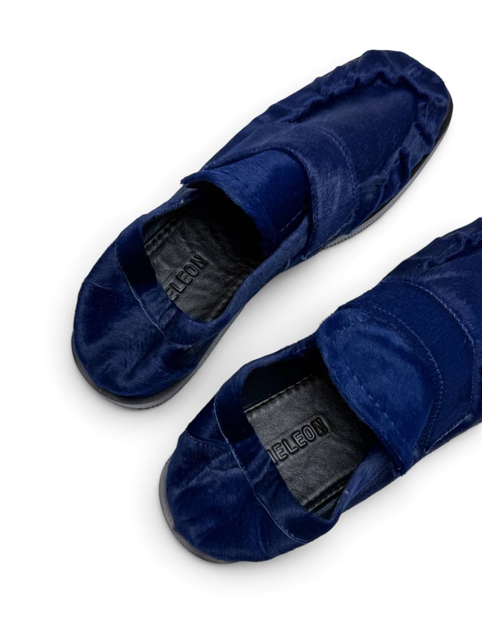 Close-up of Italian hairy leather and branded insole.