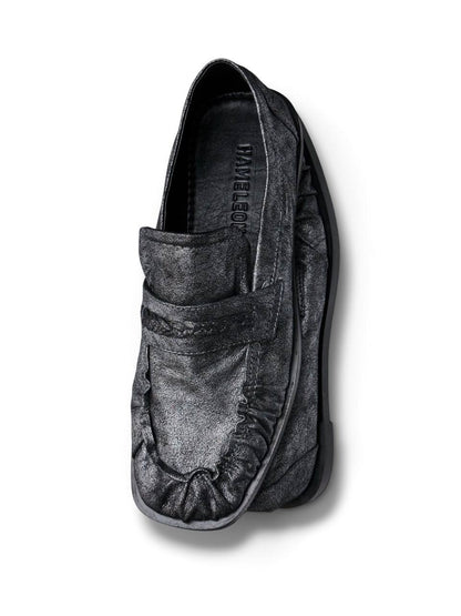 Pair of dark silver Harry loafers arranged together from above