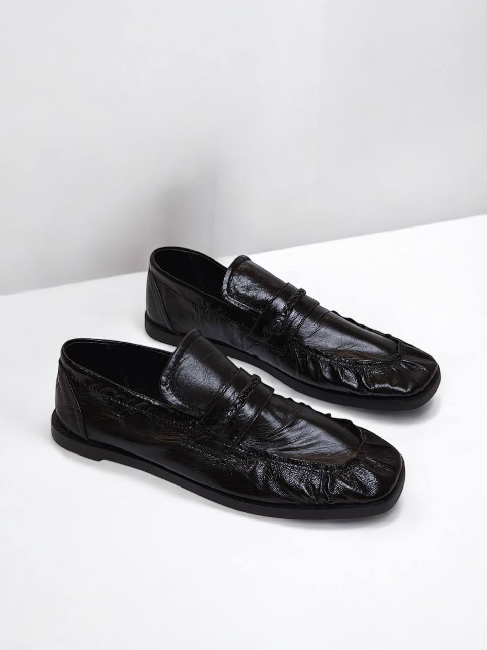 Black patent leather loafers by HAMELEON