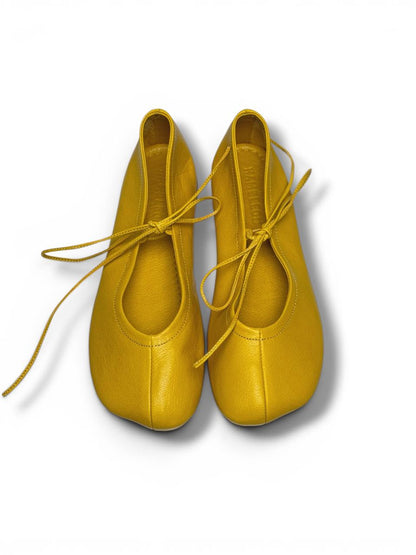 Minimal yellow ballet flats clean modern styling