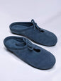 Mules Lulu Denim in soft natural suede with an open-back silhouette and delicate lace detail, shown in an angled side view