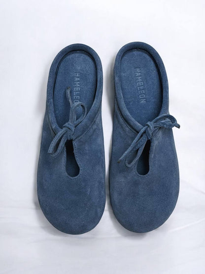 Top view of Mules Lulu Denim handcrafted from natural suede, featuring a rounded toe, suede footbed, and minimalist slip-on design
