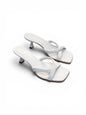 Selena Ivory white leather mules with sculpted heel front angle view