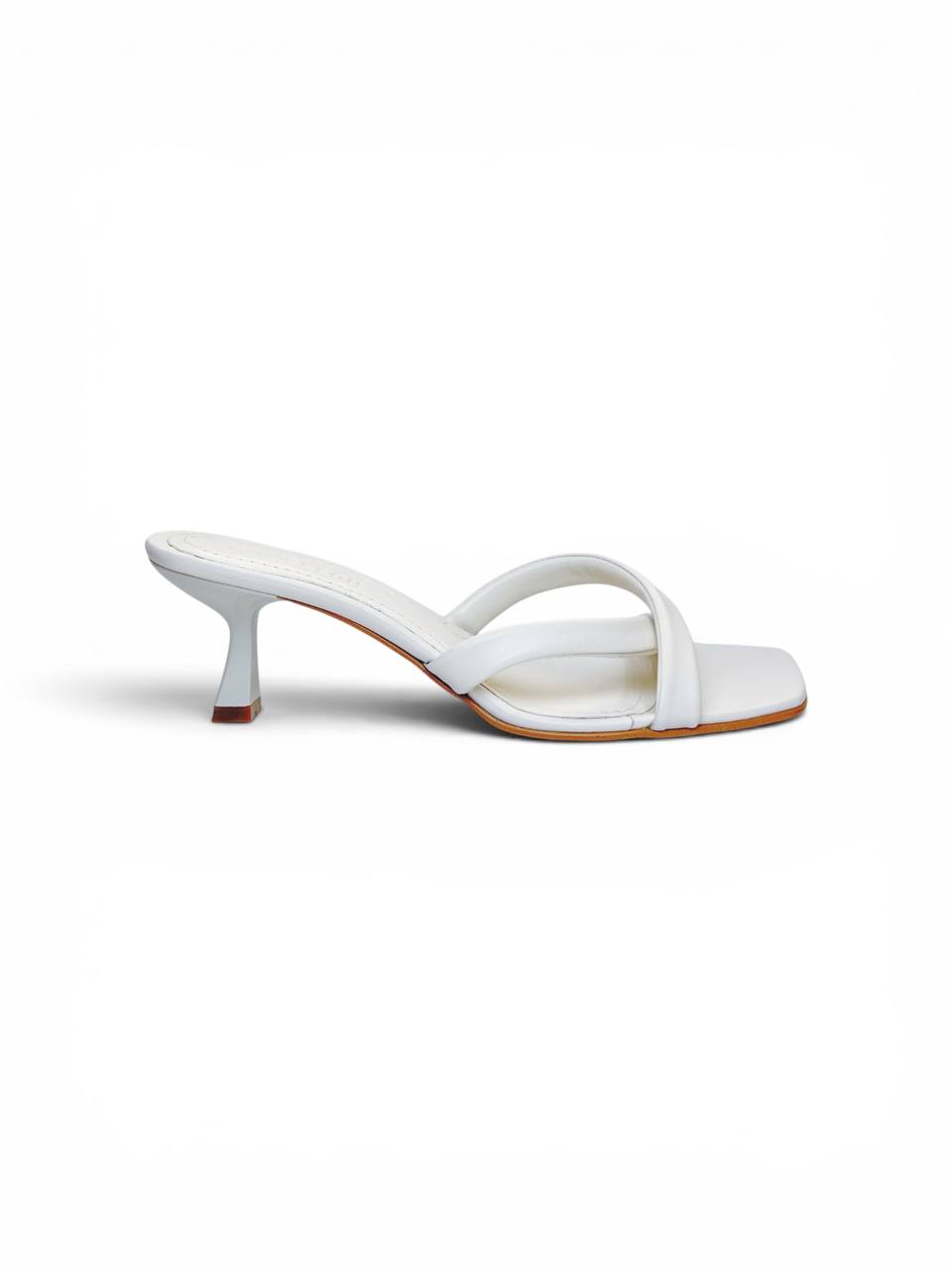 Side profile of Selena Ivory white leather heeled mules