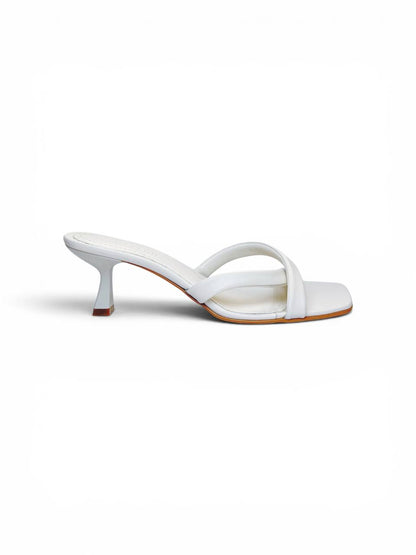 Side profile of Selena Ivory white leather heeled mules