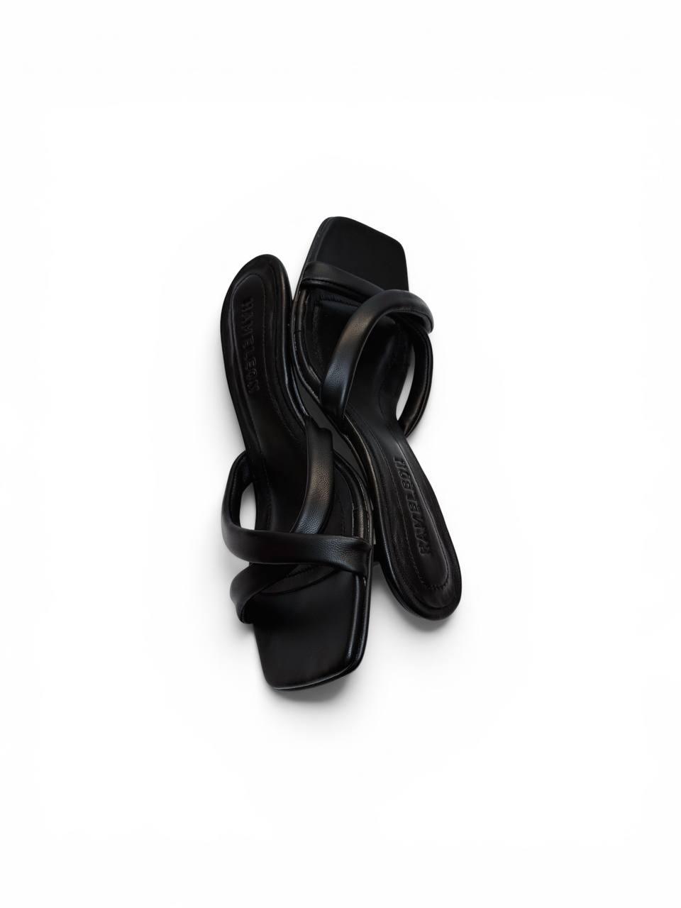 Leather-covered cushioned insole detail of Selena Noir artisan mules
