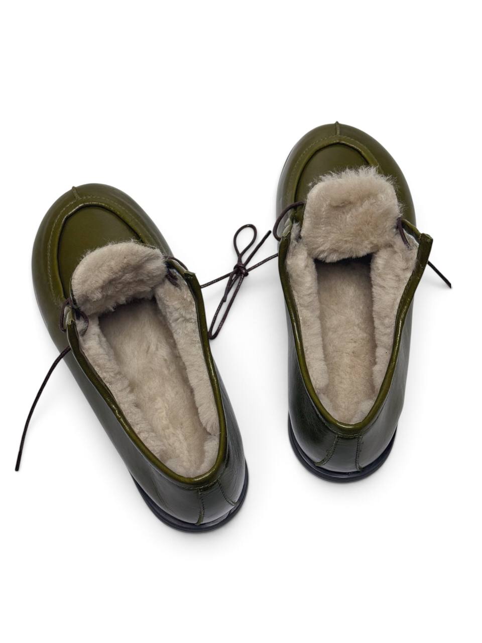 Olive leather walker shoes with natural sheepskin lining.