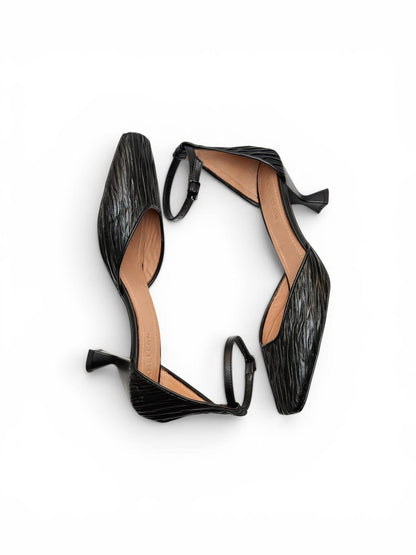 Onyx Pumps featuring refined craftsmanship and understated elegance inspired by minimalist fashion