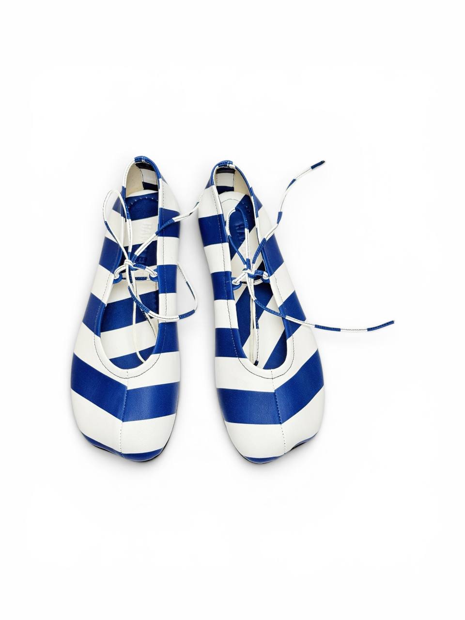 Overhead view of Ballet Flats Riviera in blue and white striped Italian leather