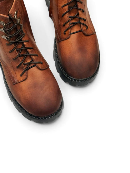 Close-up of rounded toes and dark laces on Roxy boots.