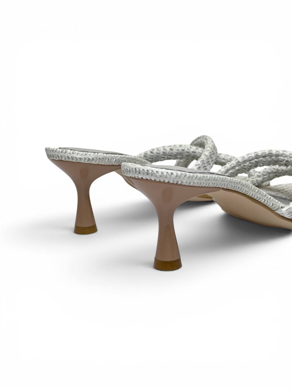 Close-up of Selena Pearl sculpted 5 cm heel on handmade white leather mules