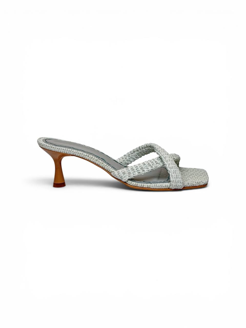 Side profile of Selena Pearl handmade white leather mules with textured woven upper