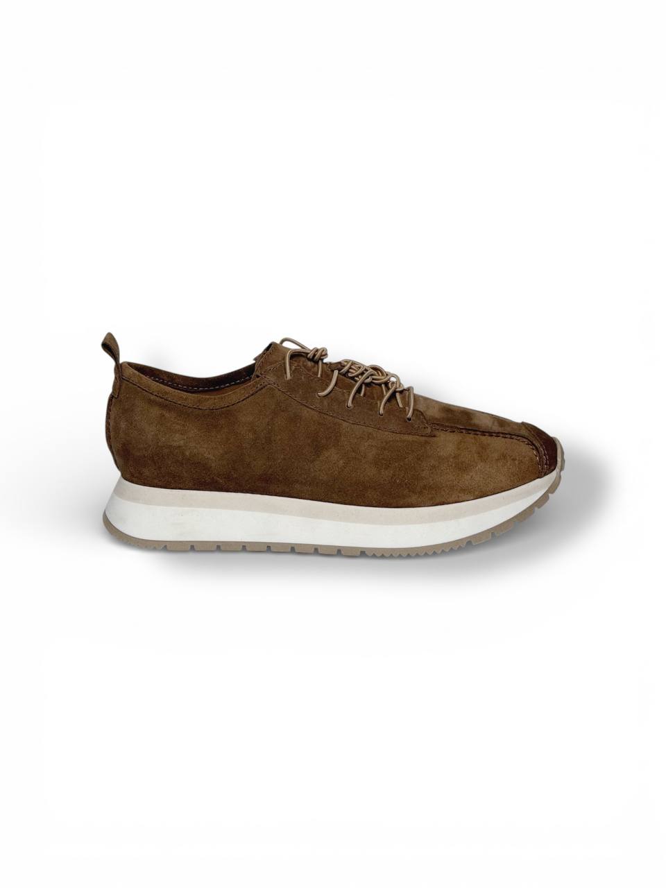 Brown sneakers side profile minimal silhouette