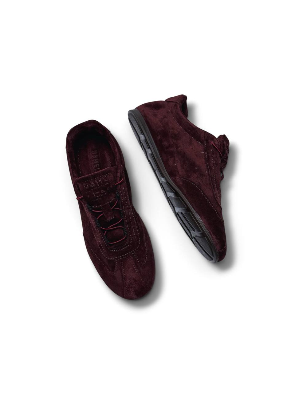 Suede sneakers by HAMELEON showing the flexible polyurethane sole