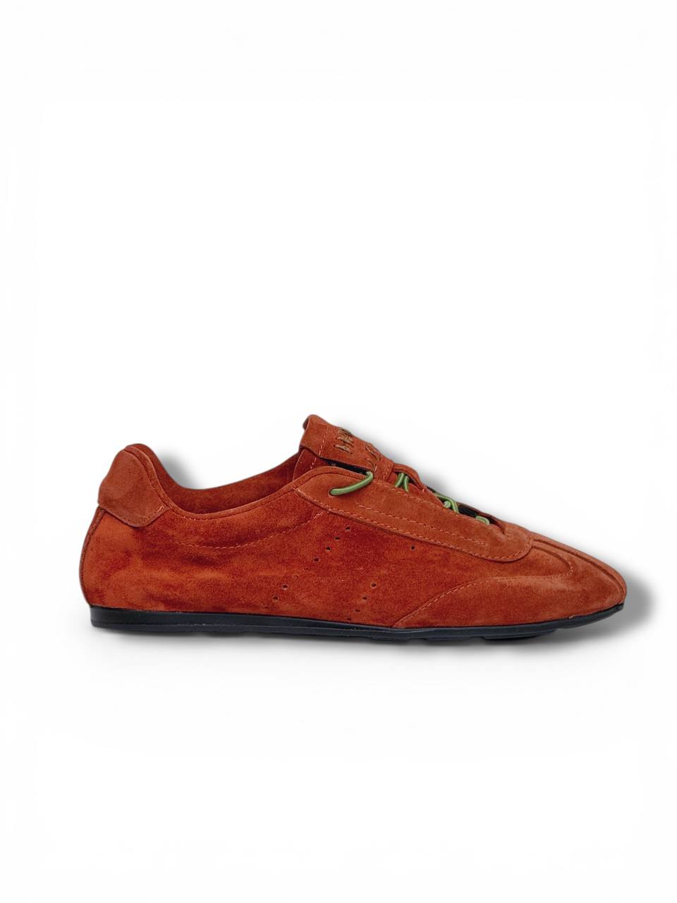 Terracotta suede sneakers with minimalist low-top silhouette