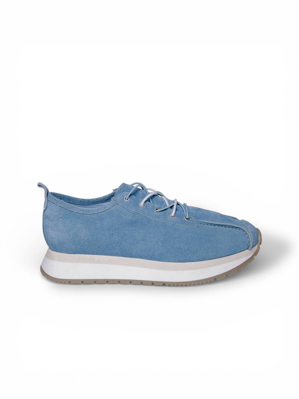 Blue sneakers side profile clean minimal design