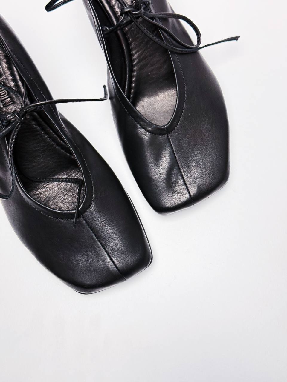 Close-up of the soft square toe on ballet flats Vesper