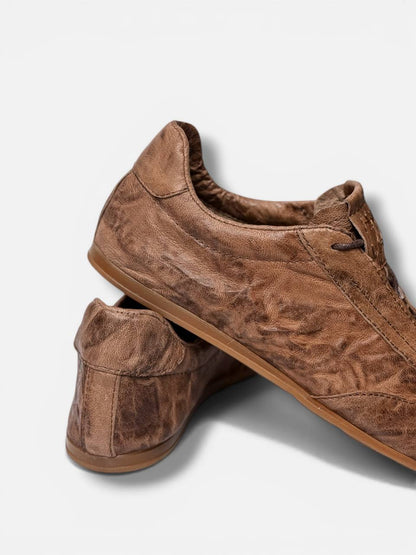 Handmade sneakers heel detail aged leather look