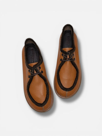 Orange leather walker shoes top view