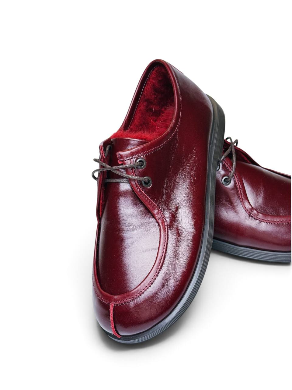 Angled view of polished burgundy Walkers Carmine leather shoes