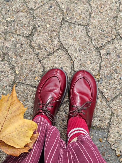Deep burgundy Walkers Carmine styled with autumn trousers outdoors