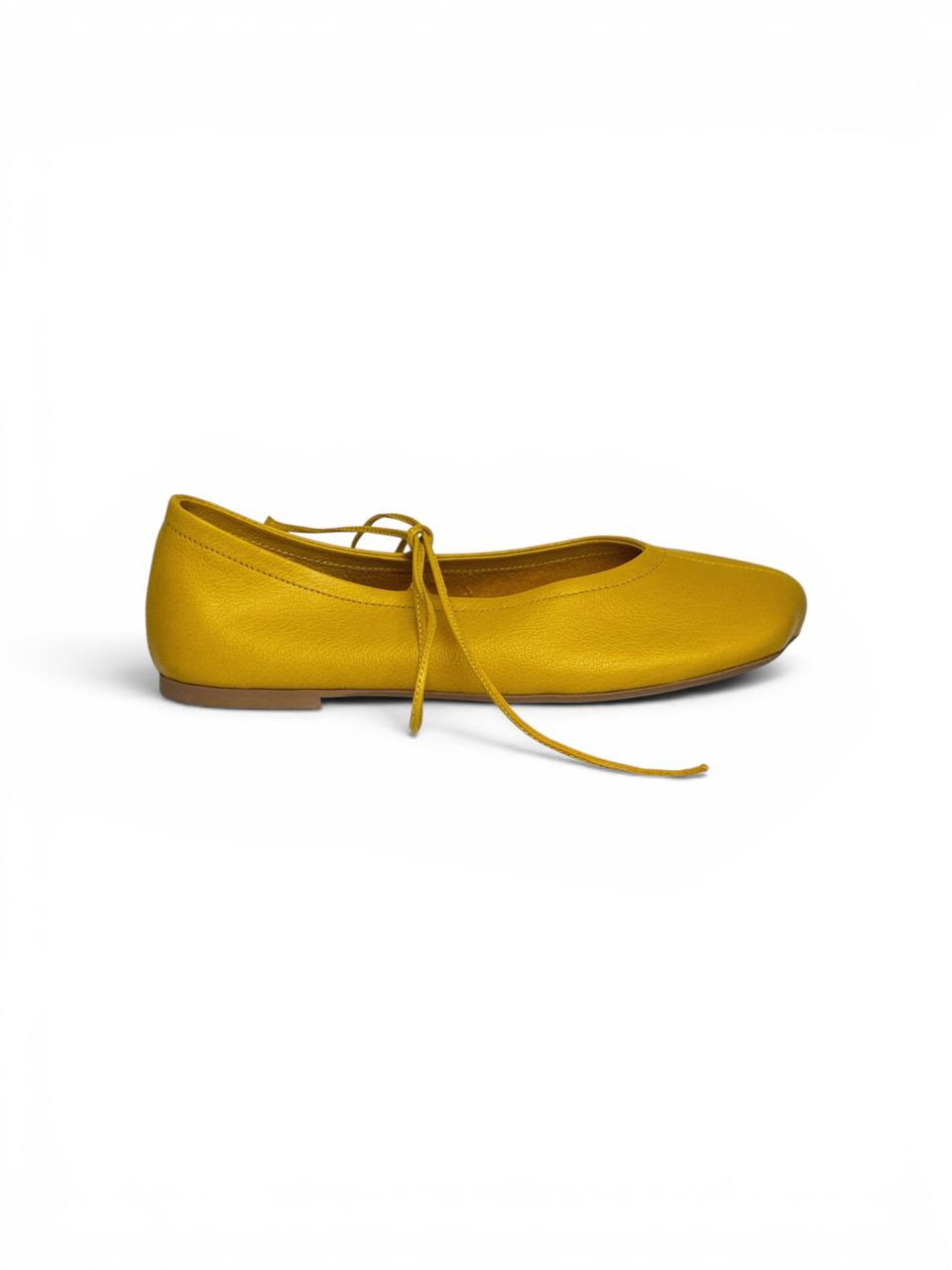 Yellow ballet flats side view soft leather design